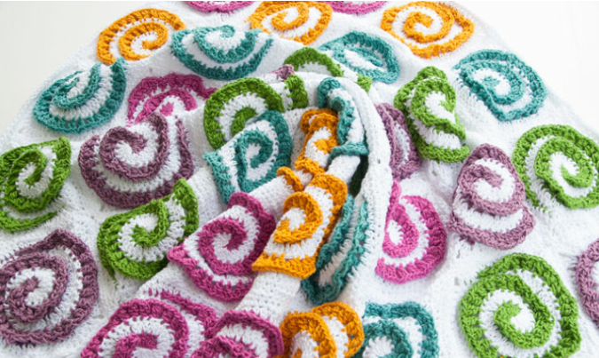 Patrón Gratis Manta Ruedas de Magia en Crochet